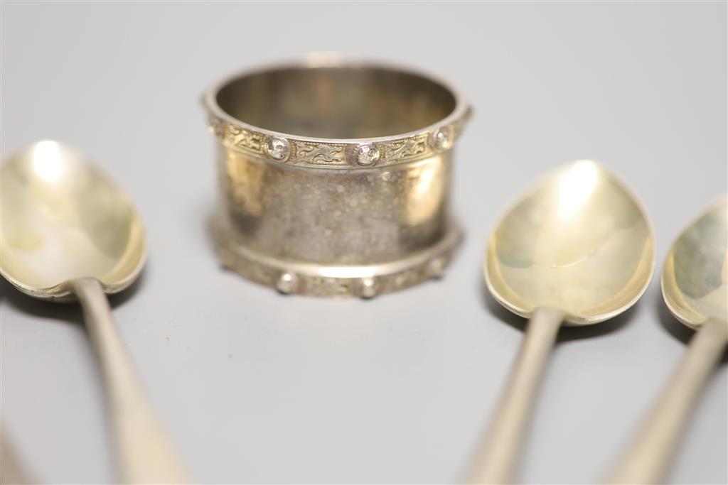 A set of six Edwardian silver teaspoons, Sheffield 1907, a similar set of teaspoons, Sheffield 1927 and a silver napkin ring, 8.5oz